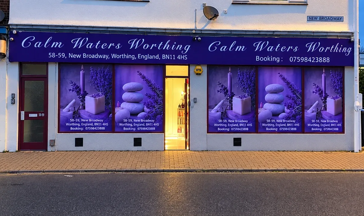 Calm Waters Worthing shop front and purple sign at 58–59 New Broadway, Worthing